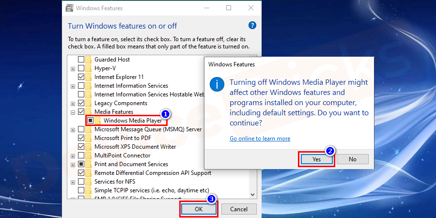 Uncheck the box next to the Windows Media Player option and restart the system.