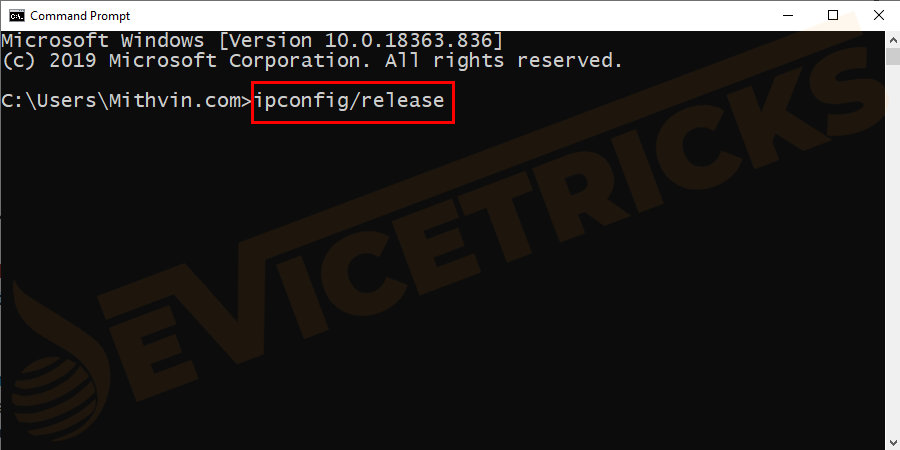 Type the command ipconfig/release and press Enter. Doing so will release the IP address assigned by the DHCP server.